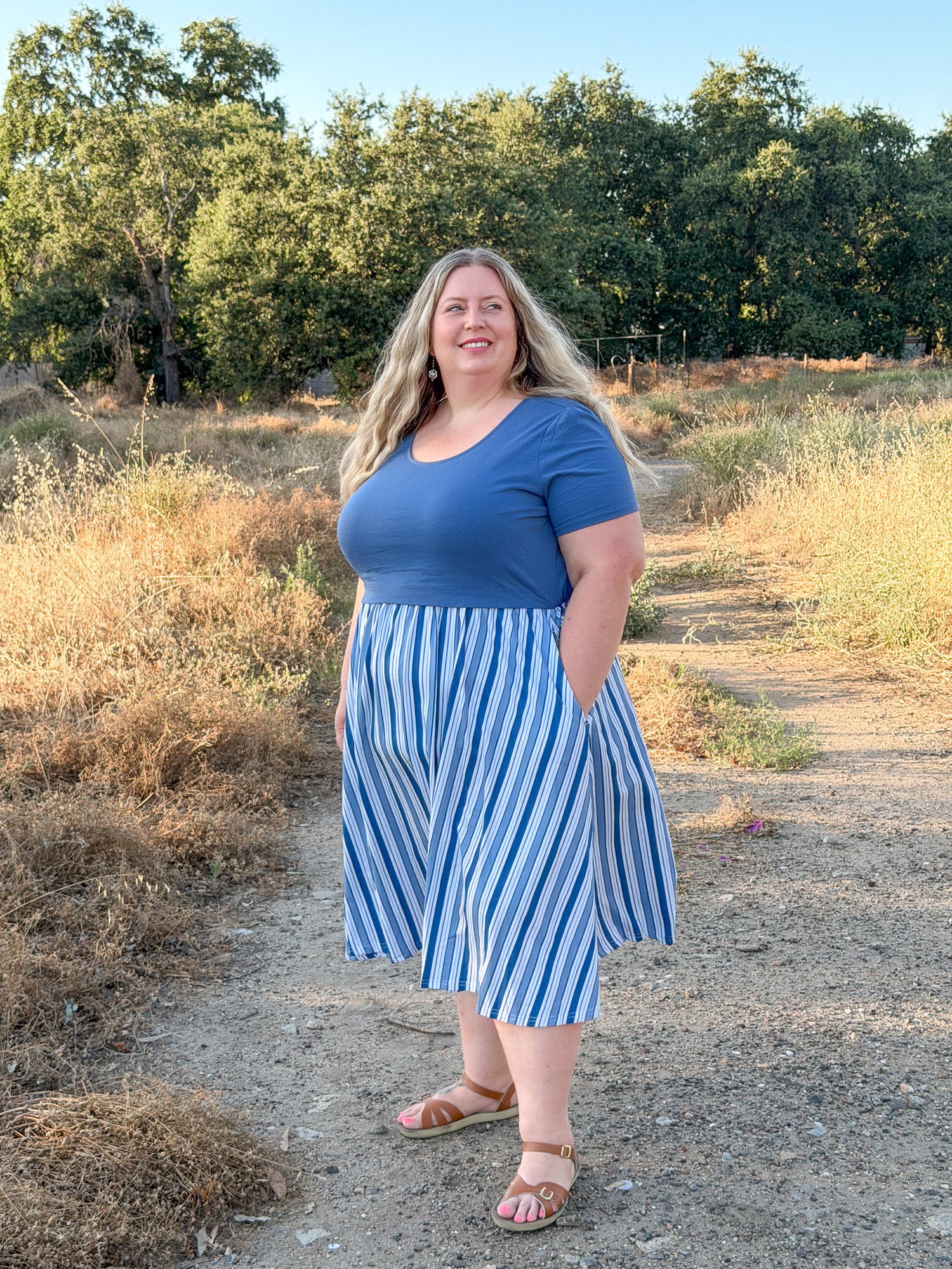 Cabana blue and white striped nursing dress side view